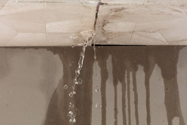 Professional Flood Damage Cleanup technician working in Upton, NY